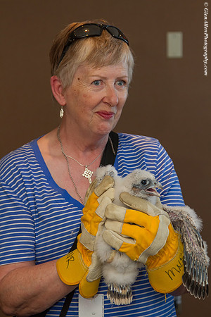 Volunteers pose with chicks